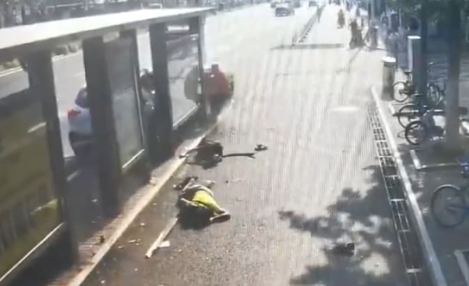 Woman Driver Slams into Bus Stop