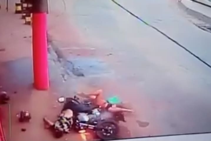 Woman Biker and Passenger Meet Pole Head On