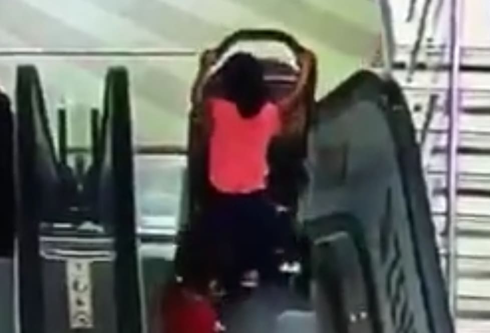 Oops: Little Girl and Brother Fall Down Escalator