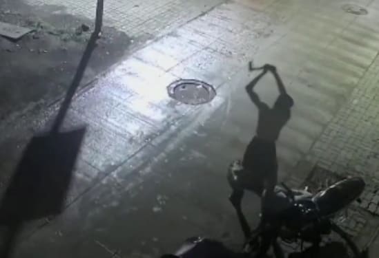 Dude Gets Brutalized with Axe