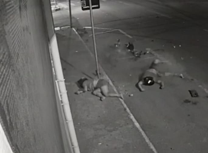 Couple Takes Flight at Intersection 