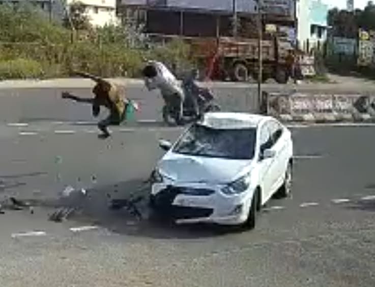 Couple Sent Flying Across The Pavement