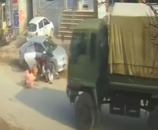 Car Door Sends Family Under Truck Wheels