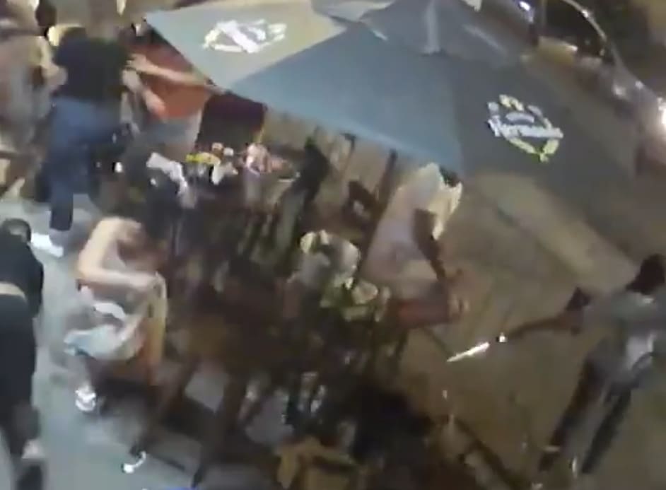 Drinks At Busy Bar Interrupted With A Headshot