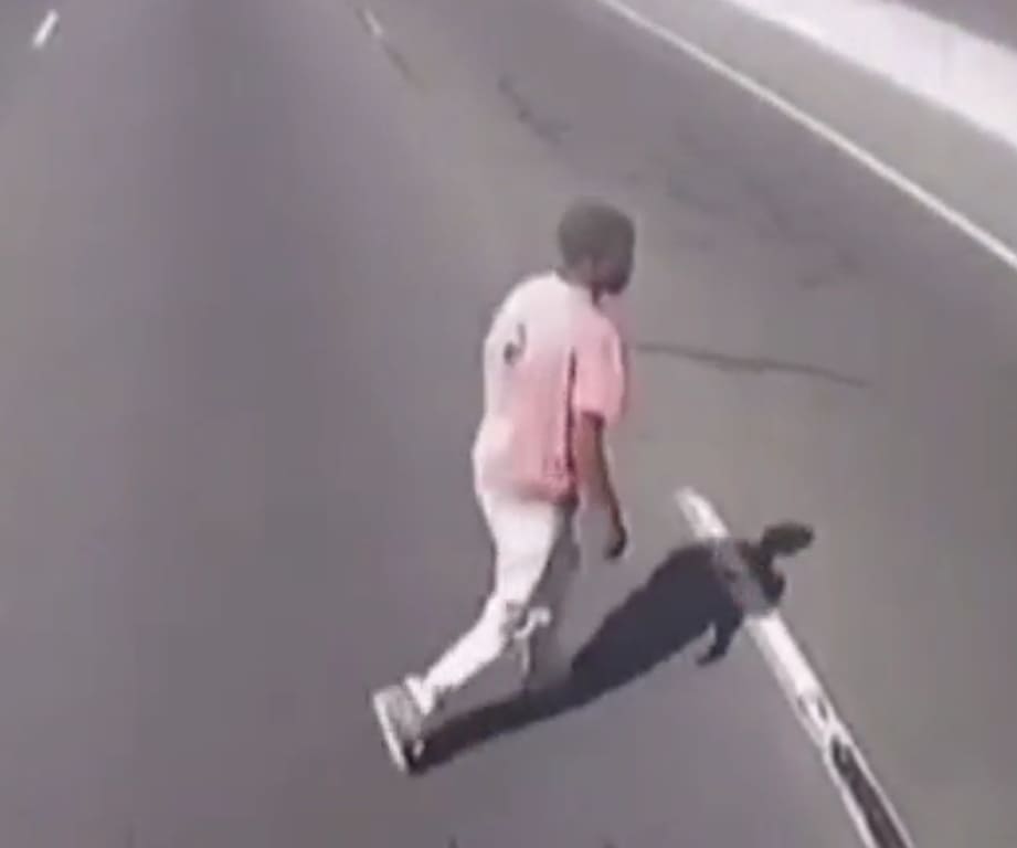 Last Stroll Across Busy Freeway