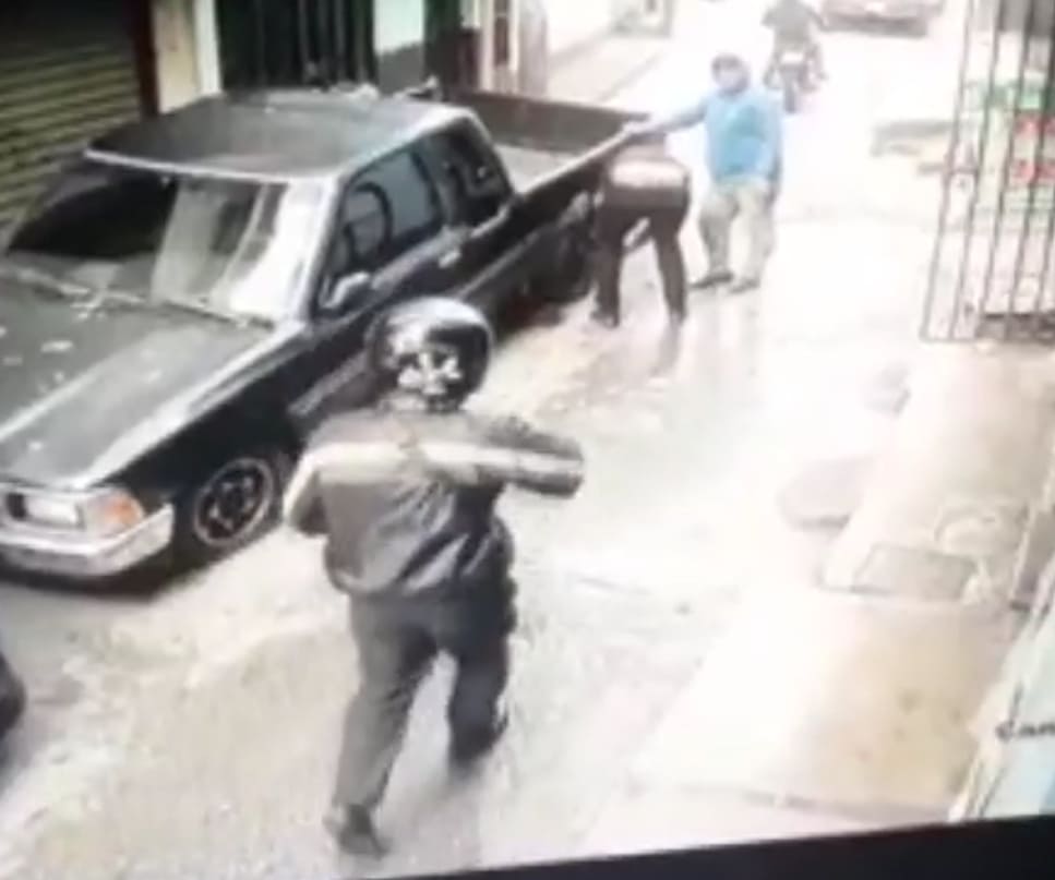 Motorcycle Hitman Guns Down Father & Son