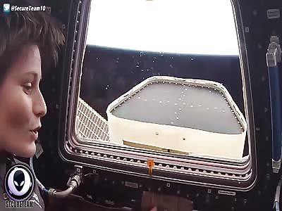 BEHIND YOU! Mystery UFO Outside ISS Window
