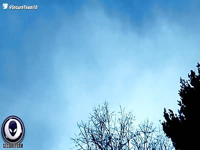 TERRIFIED Man Records Giant MACHINE UFO Hiding In Sky