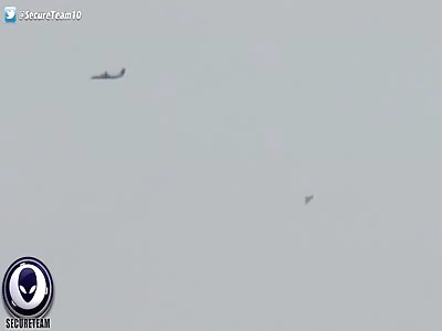 Pyramid Shaped UFO Sits Near Passing Planes