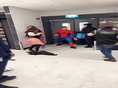 Spidey twats female supermarket worker UK