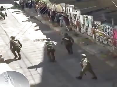 WTF, People of Chile beaten by police