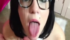 Nerdy Girl n a Bikini takes a Facial like a Pro Porn Star..Dont Let Her Fool You