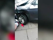 Horrific footage of victims under abandoned terrorist's car