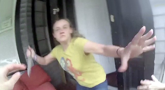 Crazy Bitch Stabs a Cop with a Butcher Knife.