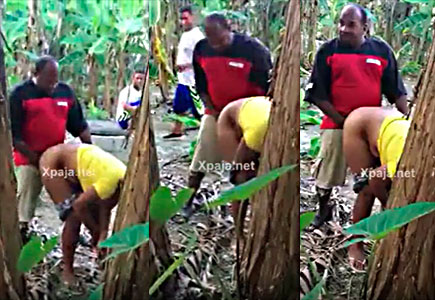 Employees and Foreman Stand in Line to Catch the Lady of the Ranch 