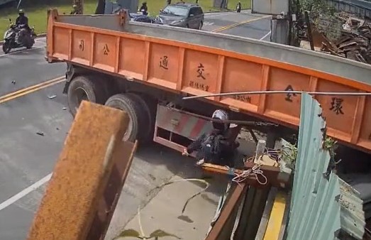 Biker Smashes into Semi, Gets Head Stuck, Somehow Survives