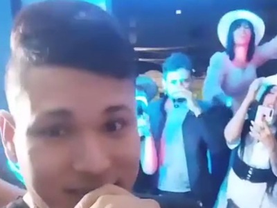 Watch the Woman with the Hat on in the Background.