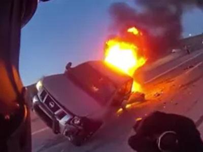 Hero Police Officer saves Woman from Fiery Crash