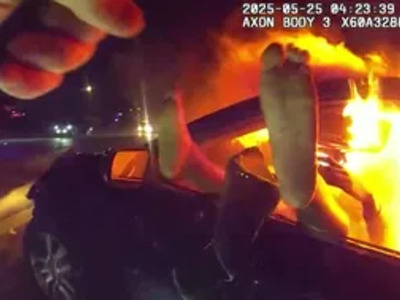 Woman Burning Alive in Car has Police trying to Help Her