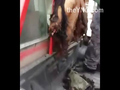 The Ragged Remains of a Man Dragged Through the Street 