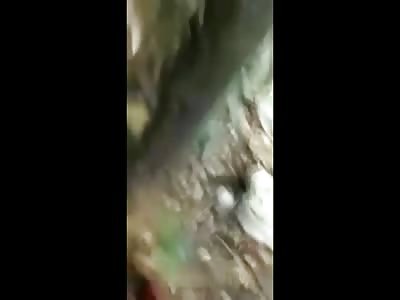 Man in Total Agony after Being Butchered by a Machete