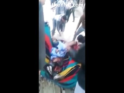 Frantic Crowd gathers to Pick up Pieces of Bodies Blown Apart from Car Bomb 