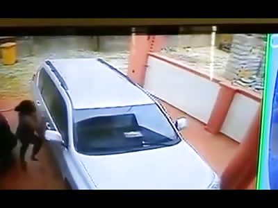 Watch the Incredible Moment a Little Kid Darts out and is Accidentally Runover by His Father