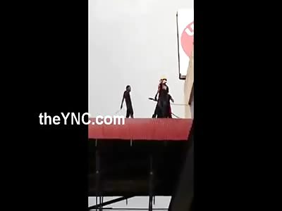 Man Fighting with Rescuers Falls to His Death