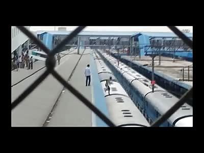 Man finds Out that there IS Electricity on Top of a Train 