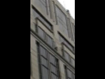 Brutal Suicide Caught on Camera Shows Man Hit Billboard Sign on the Way Down (Slow Motion) 