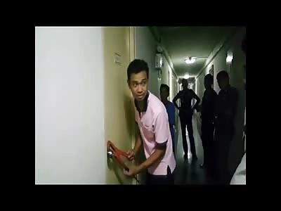 Door is Kicked In to Reveal Rotting Man Still Watching TV in his Apartment..