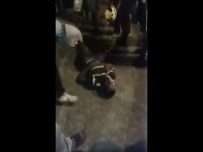 Road Rage Level Psychopath Motorcyclist Beaten While Hurting on the Ground For Running Into this Dudes Car