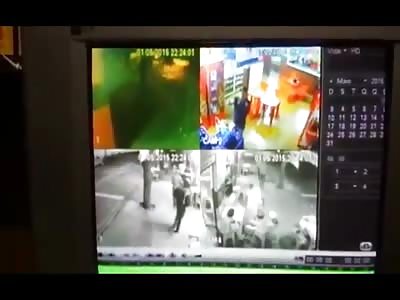 Oblivious Man Standing in Bar is Executed with a Head Shot 