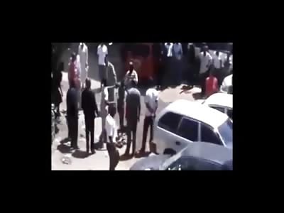 African Boy in Green Beaten Accused of Stealing