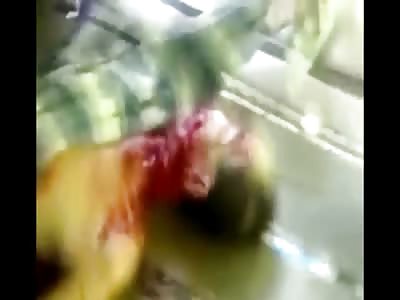 Bizarre Death Video of a Man's Head being Removed with a Machete Type Hook..A Note is Left next to his Head 