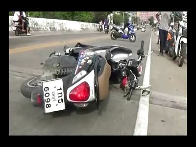 Contorted Woman in the Street is in Pain as EMT's Try to Straighten out Her Leg 