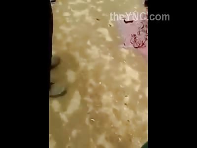 Man Agonizing in His Blood after Being Shot