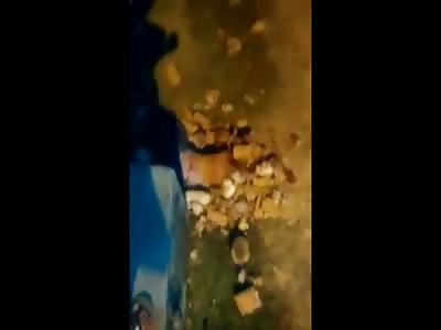 Rapist Caught in the Act was Killed by Mob with Many Many Stones..Female Victim still on Scene 