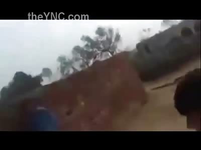 Arab Man Cleaning out his Automatic LOADED Machine Gun in Front of his Little Son.... What Could Go Wrong?