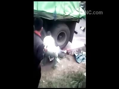 Woman is Killed and Crushed Underneath Wheel of Huge Truck ... Driver Tries to Remove Her