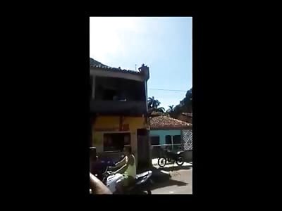 Man Trying to Rescue Another is Electrocuted on top of Building