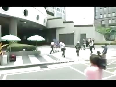 Man does Back Flip off of Building in Suicide Attempt