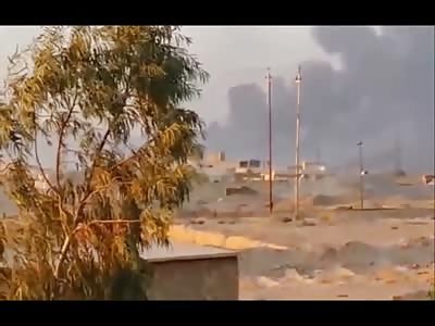 Iraqi Troops Hide behind Concrete Barrier to Live through ISIS Car Bomb Attack 