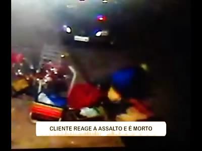 Man in Yellow Shirt Reacts to Robbery and is Killed .. Makes it From Street back into Store Where he Bleeds Out