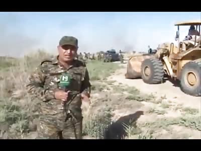 News Reporter Announcing the Success of the Iraqi Army gets a Rude Awakening 