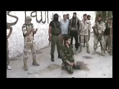 New Pistol Execution from ISIS of a Calm Man in Soldier's Fatigues 