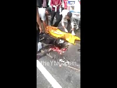 The Remains of a Dead Biker Head Crushed inside his Helmet
