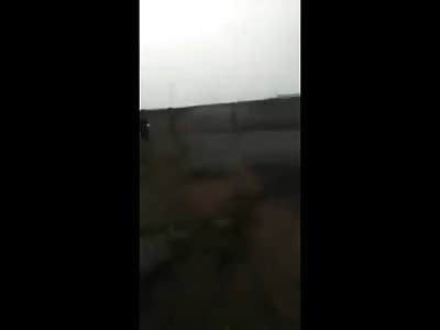 Video from a Distance shows a Man being Machine Gunned to Death in the Desert 