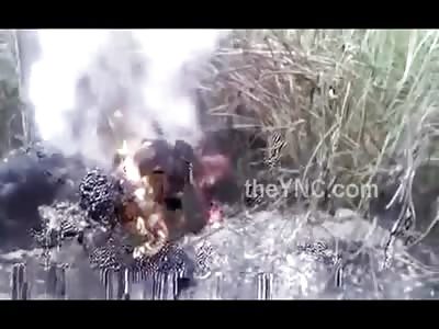 Woman Murdered by Her Husband Set on Fire Lies Burning by the Road 