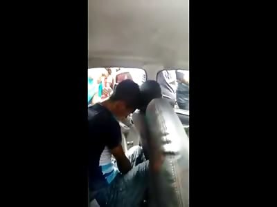 Crowd can do Nothing but Watch as a Delirious Boy Slowly Dies in the Back Seat 